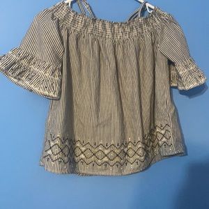 Gray and white shirt.